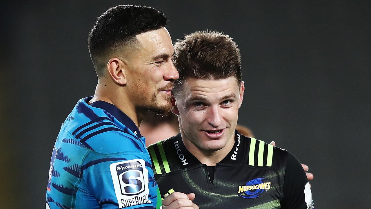 Sonny Bill Williams of the Blues congratulates Beauden Barrett of the Hurricanes.