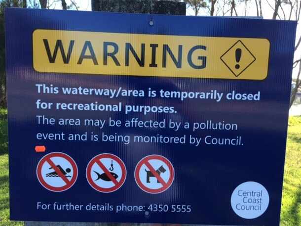 Water-pollution warning sign put up by Central Coast Council.