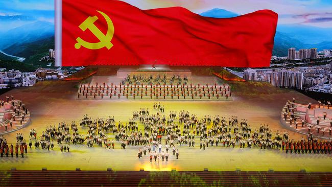 Actors perform to celebrate the 100th anniversary of the founding of the Chinese Communist Party at the Bird’s Nest Stadium in Beijing on Monday. Picture: Getty Images