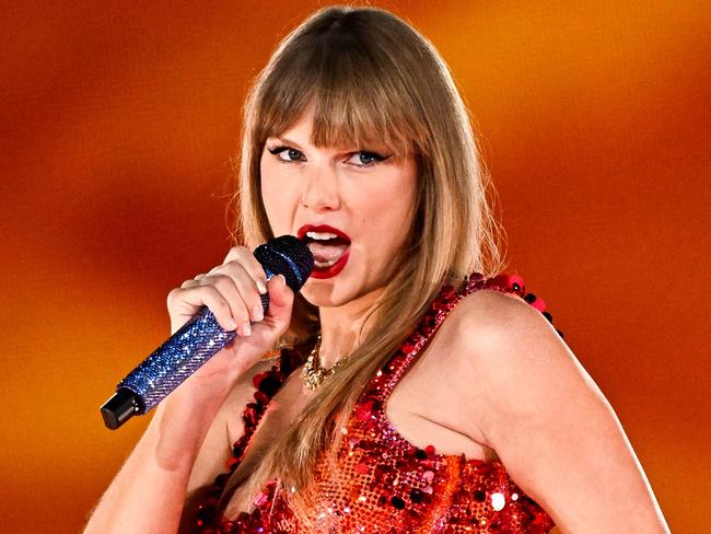 TOPSHOT - US singer and songwriter Taylor Alison Swift, also known as Taylor Swift, performs on stage at the Paris La Defense Arena as part of her The Eras Tour, in Nanterre, north-western France, on May 9, 2024. (Photo by JULIEN DE ROSA / AFP)