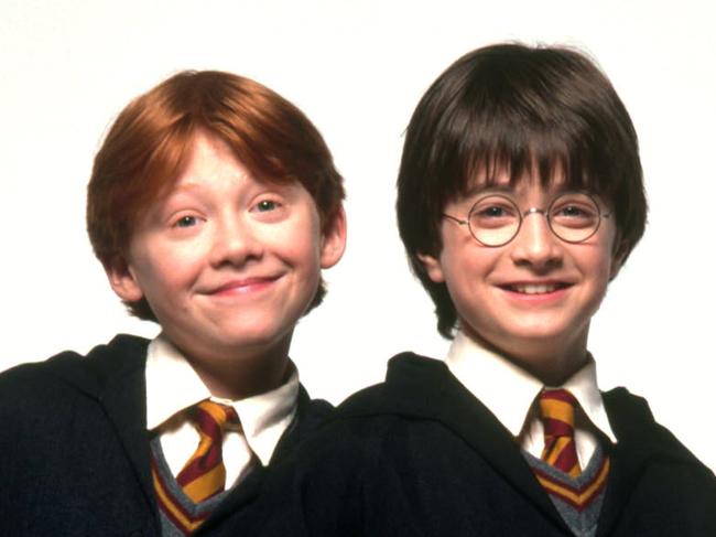 (L-r) Actor Rupert Grint with Daniel Radcliffe in film "Harry Potter and the Philosopher's Stone". philosophers  /Films/Titles/Harry/Potter/and/the/Philosophers/Stone