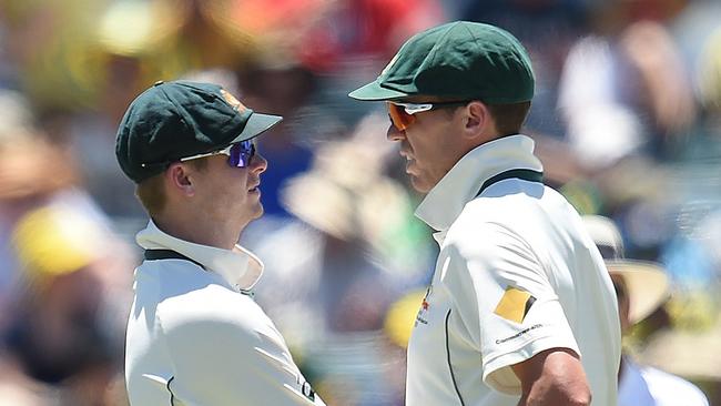Steve Smith and Peter Siddle. (AAP Image/Dave Hunt).