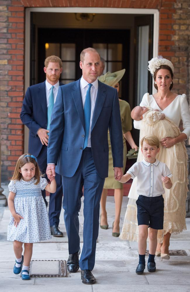 Princess Charlotte and Prince George hold the hands of their father, Prince William, Duke of Cambridge, as they arrive at the Chapel Royal, St James's Palace, London for the christening of their brother, Prince Louis, who is being carried by their mother, Catherine, Duchess of Cambridge on July 09, 2018 in London, England. Picture: Dominic Lipinski