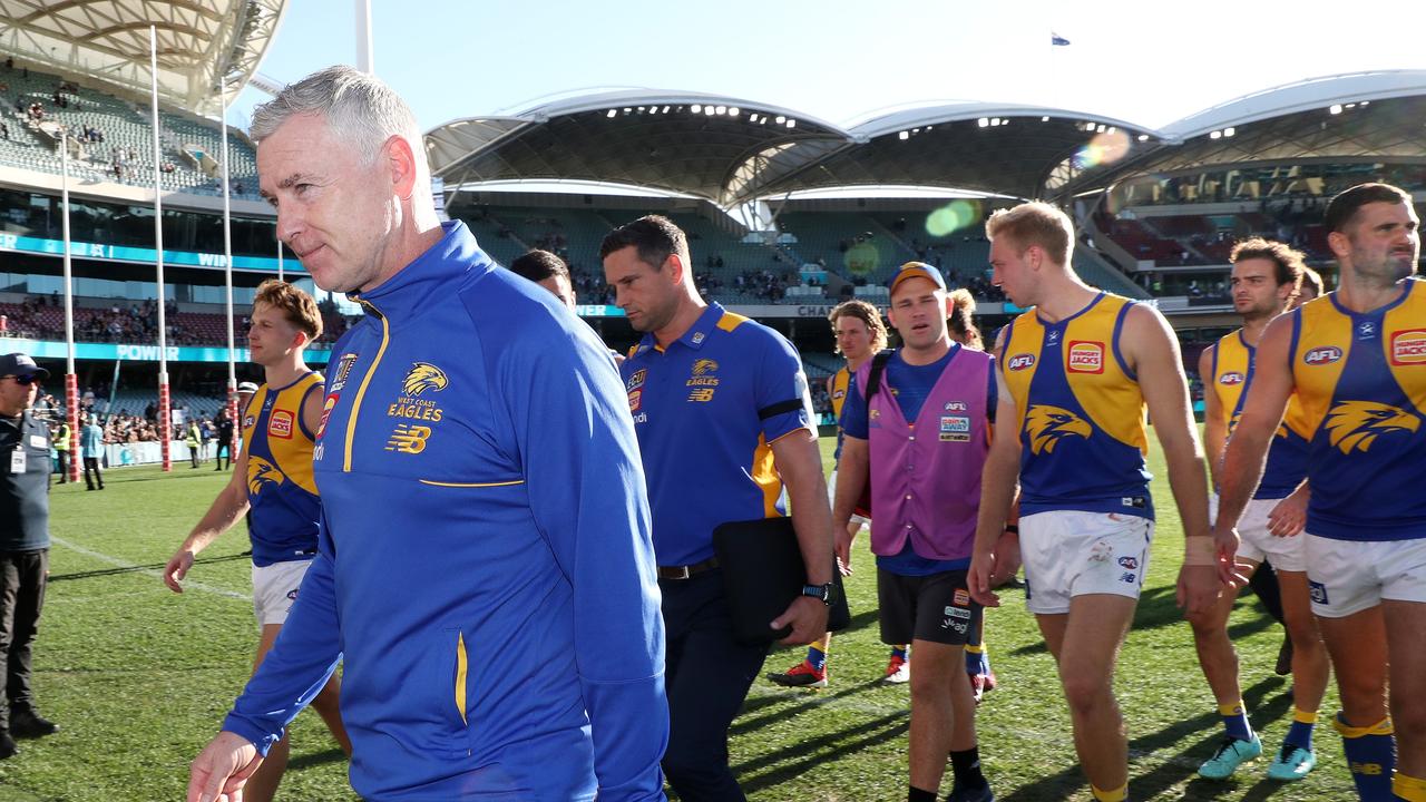 The Eagles trudge off after another loss. Picture: Sarah Reed/AFL Photos via Getty Images