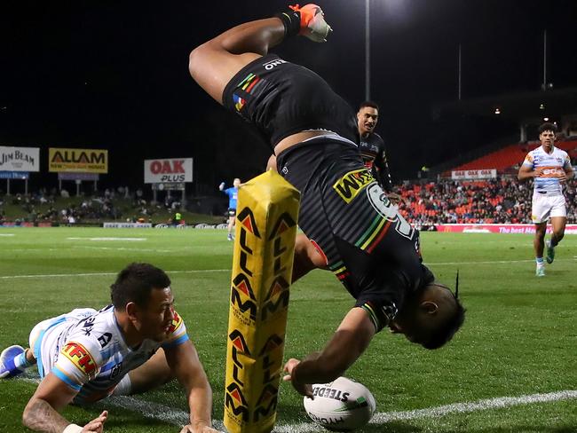 Penrith winger Brian To'o is fully airborne as he scores in the corner. Picture: Getty Images