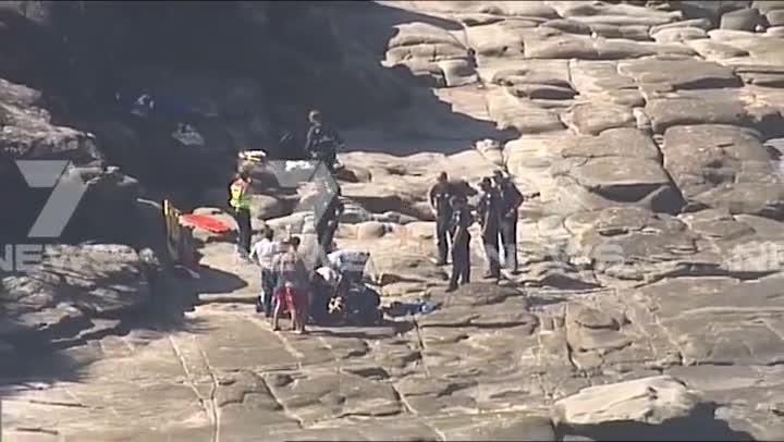 Hang-glider crashes into cliffs