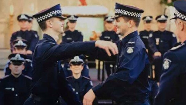 Josh Prestney (left) at his graduation ceremony with his brother Alex. Picture: Victoria Police