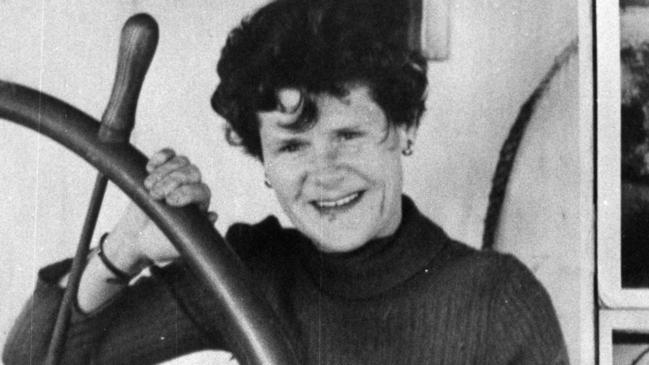 Australia’s first female paddle streamer captain Pearl Wallace at the wheel of her boat the Kookaburra, in 1958.