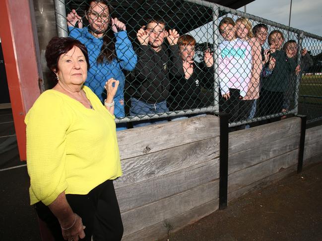 Grandmother Jenny Welsh is angry the GDFL is charging children to attend this year's finals. Jenny is pictured with her grandchildren and their cousins and friends. Picture: Alan Barber