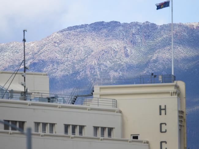 kunanyi/Mt Wellington looms above the HCC offices. Picture: RICHARD JUPE