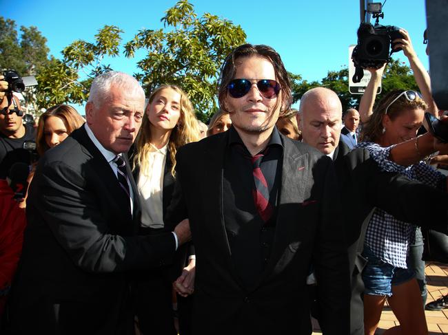 Johnny Depp outside court on the Gold Coast in April 2016, where Amber Heard pleaded guilty to producing a false document to Australian customs officials. 