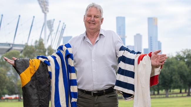 Roach with all the footy jumpers for the clubs he has played for. Picture: Jason Edwards