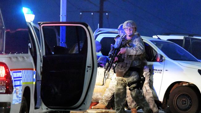 A man is held down by police after the shooting incident in Darwin last night. Picture: Keri Megelus