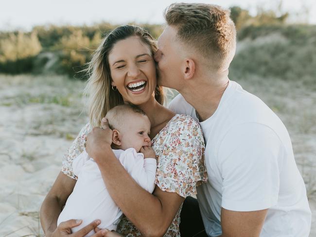 Kim Ravaillion and Adam Treloar with Georgie. Picture: Veronika Sanderson Photography