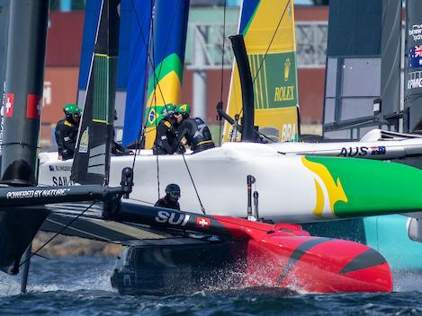 Switzerland SailGP Team helmed by Sebastien Schneiter in close action with Australia SailGP Team on Race Day 1 of the Rolex Los Angeles Sail Grand Prix held in the Port of Los Angeles, California, USA. Saturday 15 March 2025. Rolex SailGP Championship Event 4 Season 2025. Photo: Felix Diemer for SailGP. Handout image supplied by SailGP