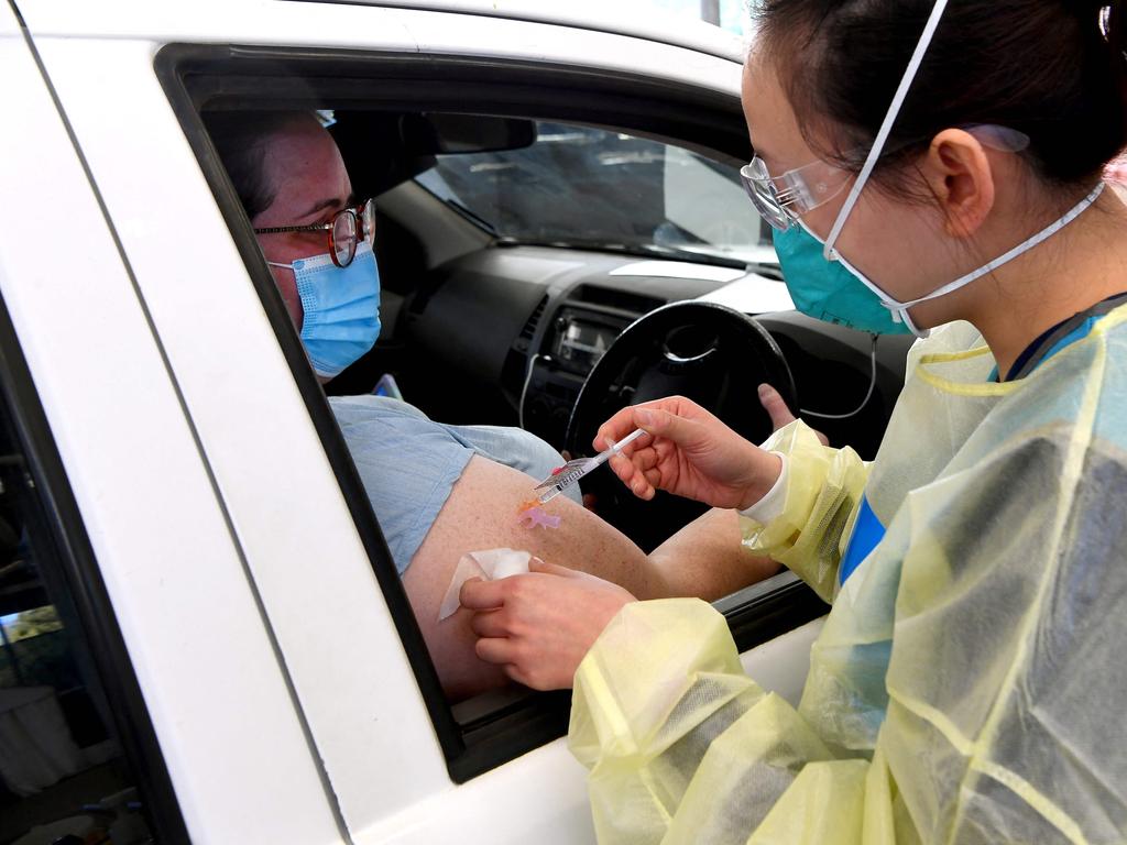 Unions and business are calling on Scott Morrison and the national cabinet to take control of workplace vaccinations. Picture: AFP