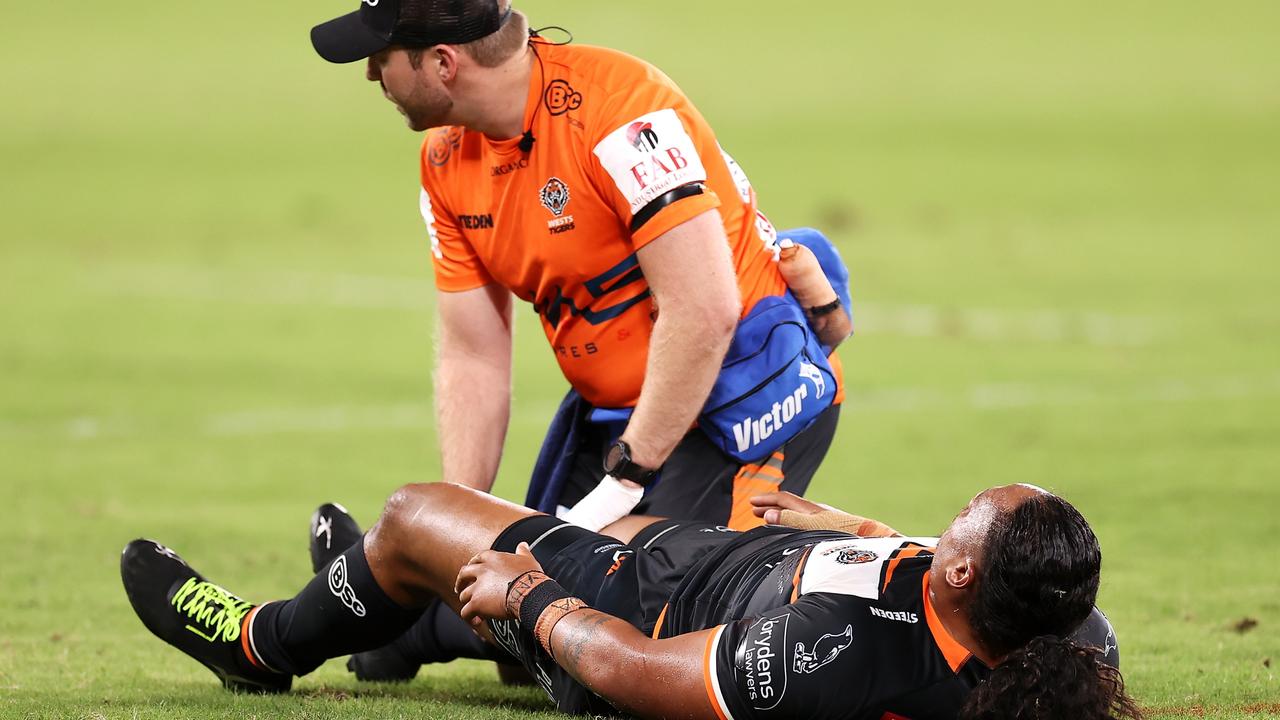 Luciano Leilua receives attention after the tackle. Picture: Mark Kolbe/Getty Images