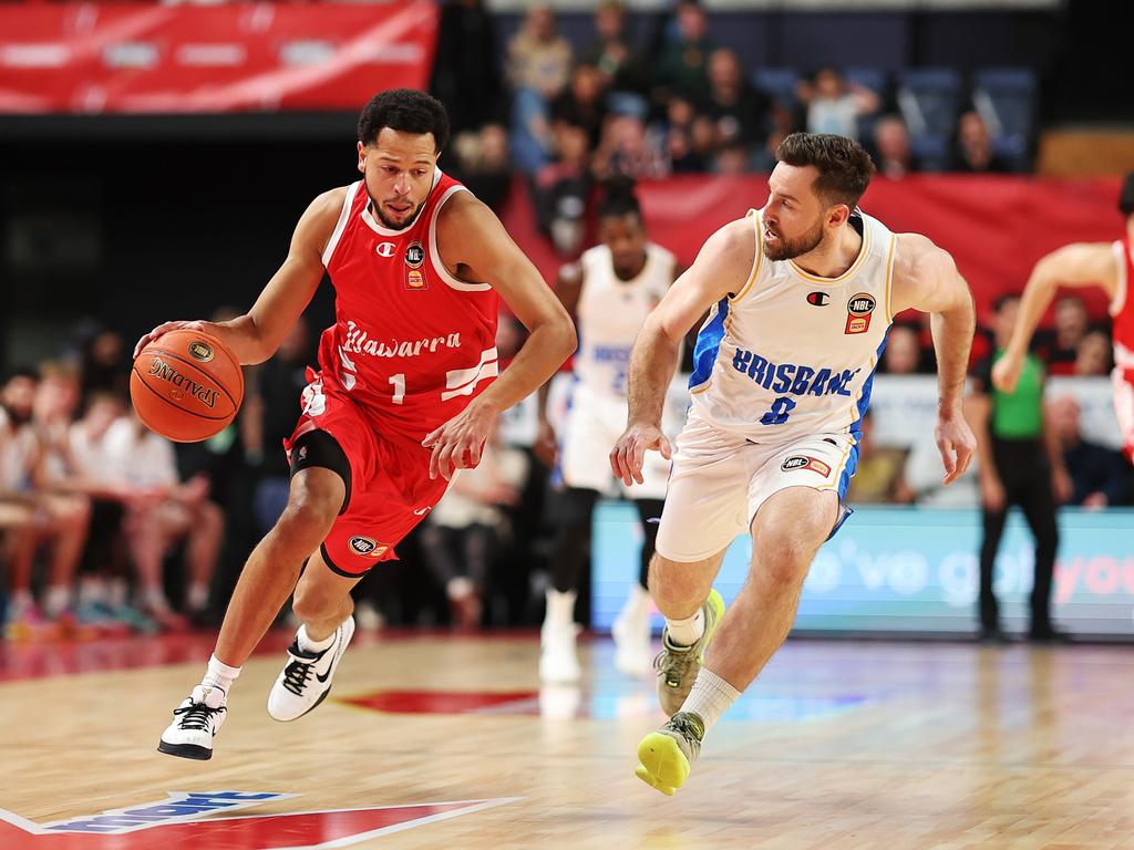 Hawks star Tyler Harvey is guarded by Bullets veteran Mitch Norton. Picture: Getty Images