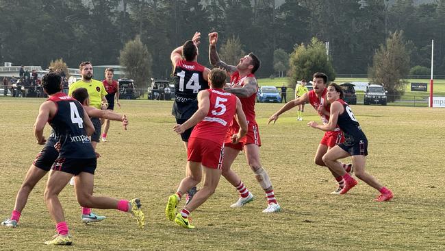 Sorrento ruckman Liam Buxton goes up against Chris Carey.