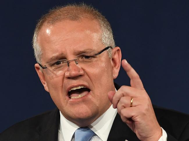 Australia's Prime Minister Scott Morrison gives his victory speech after winning the Australia's general election in Sydney on May 18, 2019. - Australia's ruling conservative coalition appeared to secure a shock election win on May 18, with the party predicted to have defied expectations and retained power. (Photo by Saeed KHAN / AFP)