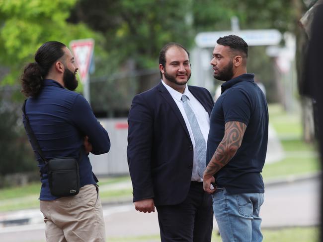 Zachariah Obeid (left) talking with his brother Ihab Obeid (right) and his solicitor (middle). Picture: Sue Graham