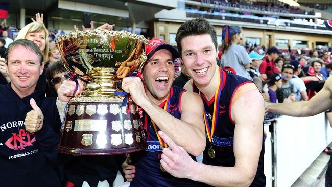 Allan, pictured with holding the Thomas Seymour Hill Trophy with Ben Jeffries, joined Norwood in 2014 and won the premiership after a long career with North Adelaide. Picture: Mark Brake