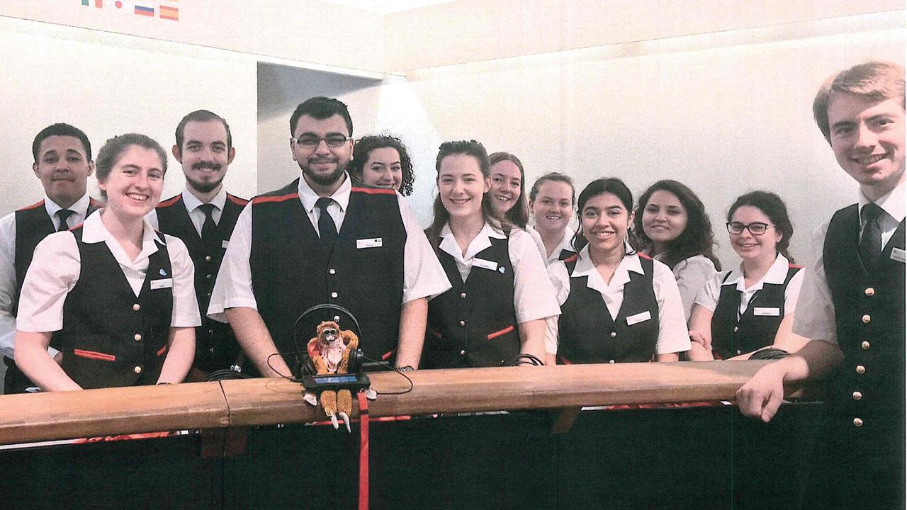 Harriet with Buckingham Palace staff. Picture: supplied