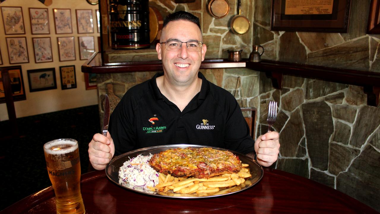 D'Arcy Arms Irish Pub Head Chef, Lee Palmer, with the Mega Parma meal.