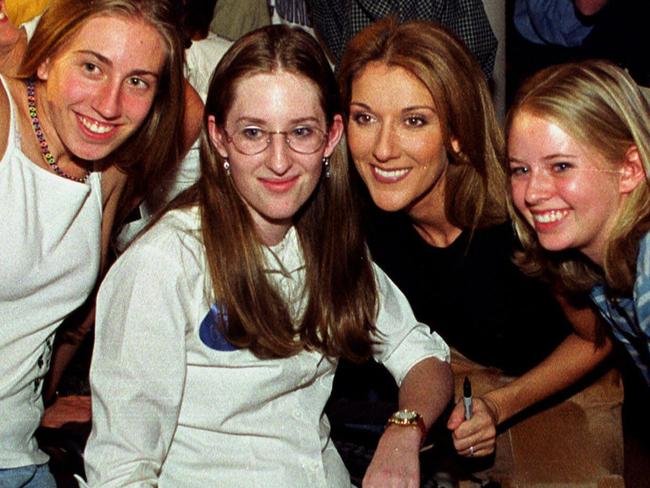 FILE -  Celine Dion, third from l,   with Columbine High School students, from l , Beth Ratay,  Anne Marie Hochhalter and Kim Chlumsky  in Denver in this Oct. 02, 1999      AP Photo/The/Denver/Post)