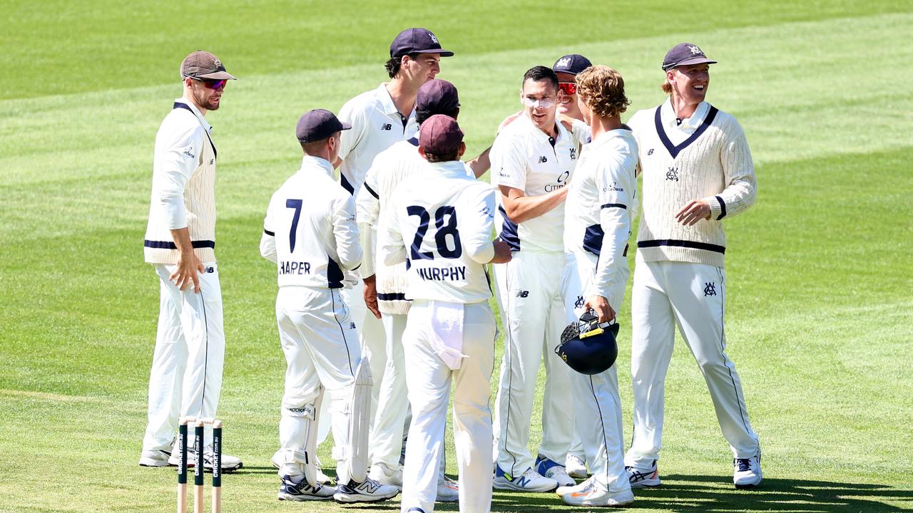 Scott Boland of Victoria is congratulated by teammates after taking the wicket of Sam Konstas. Picture: Josh Chadwick/Getty Images