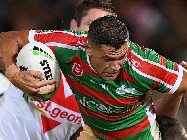 Braidon Burns of the Rabbitohs is tackled by Jeremy Latimore (left) and Ben Hunt of the Dragons during the Round 2 NRL match between the St. George Illawarra Dragons and the South Sydney Rabbitohs at Jubilee Stadium, Sydney, Thursday, March 21, 2019. (AAP Image/Dan Himbrechts) NO ARCHIVING, EDITORIAL USE ONLY