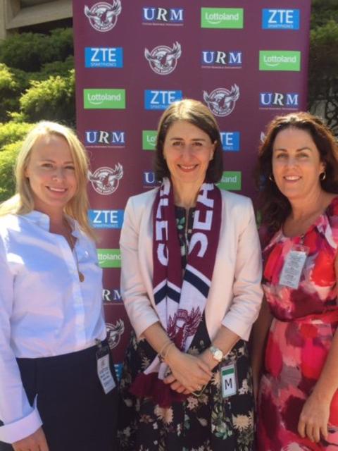 The Sea Eagles announced their new Number 1 ticket holder as Premier Gladys Berejiklian (centre) last year. Yesterday she did not respond to questions.