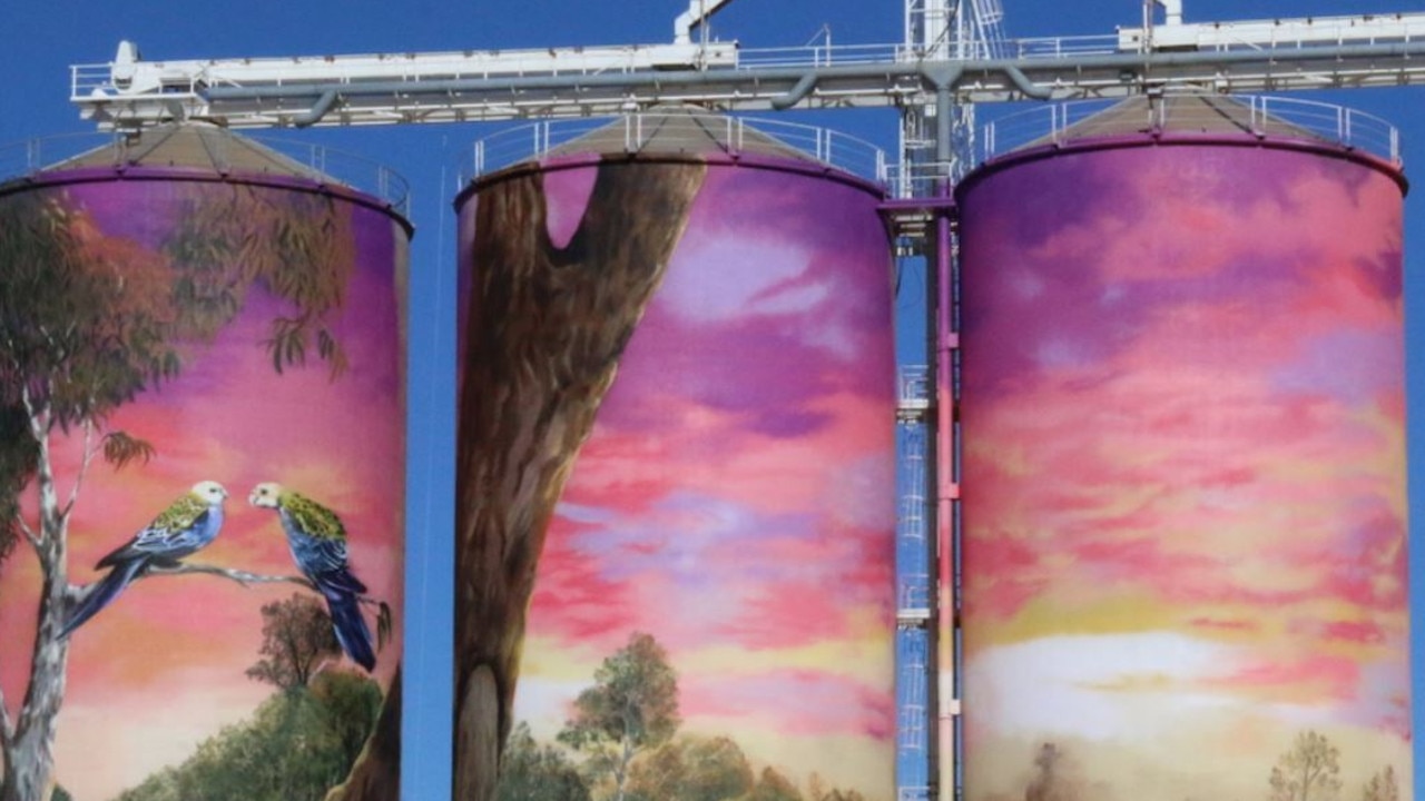 The three silos in Thallon, painted by Joel Fergie.