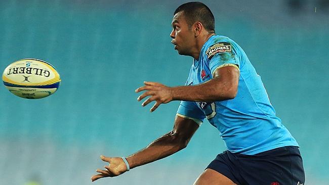 Kurtley Beale gets a pass against the Reds in a dominant display in the unfamiliar position of No.12.