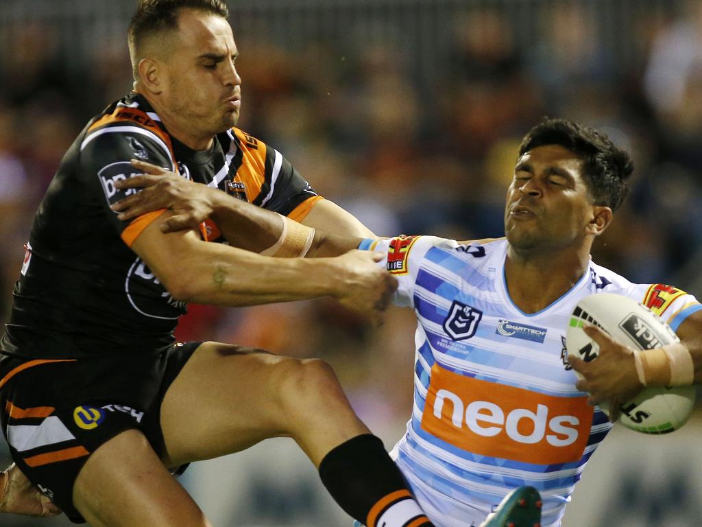 Tyrone Peachey of the Titans under pressure during the Round 7 NRL match between the Wests Tigers and the Gold Coast Titans at Scully Park in Tamworth, Saturday, April 27, 2019. (AAP Image/Darren Pateman) NO ARCHIVING, EDITORIAL USE ONLY