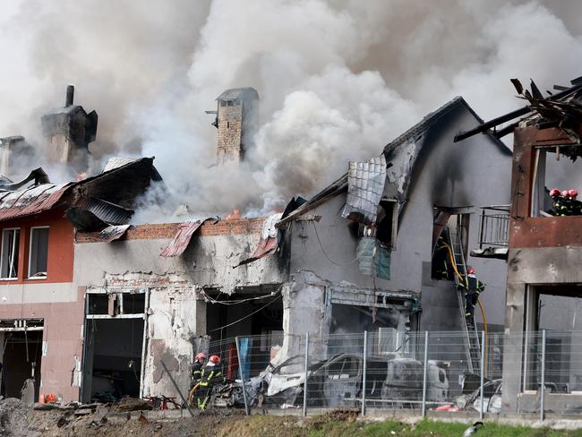 Firefighters battle a blaze after a civilian building was hit by a Russian missile in Lviv, Ukraine. Picture: Getty Images