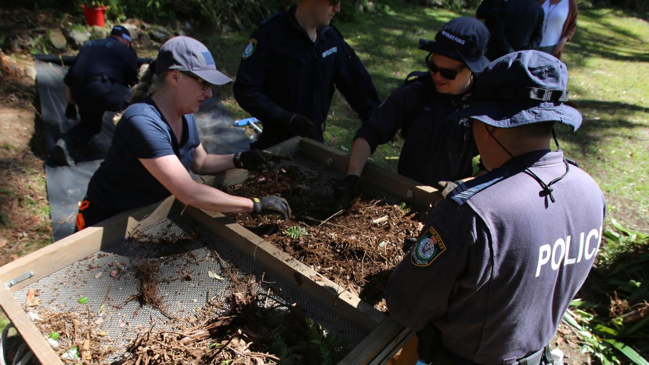 Officers sorted through large sections of soil using giant sieves. Picture: NSW Police