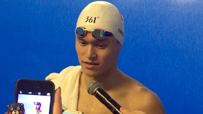 Chinese swimmer Sun Yang talks to the media after his 1500m freestyle heat. Picture: Mike Colman.