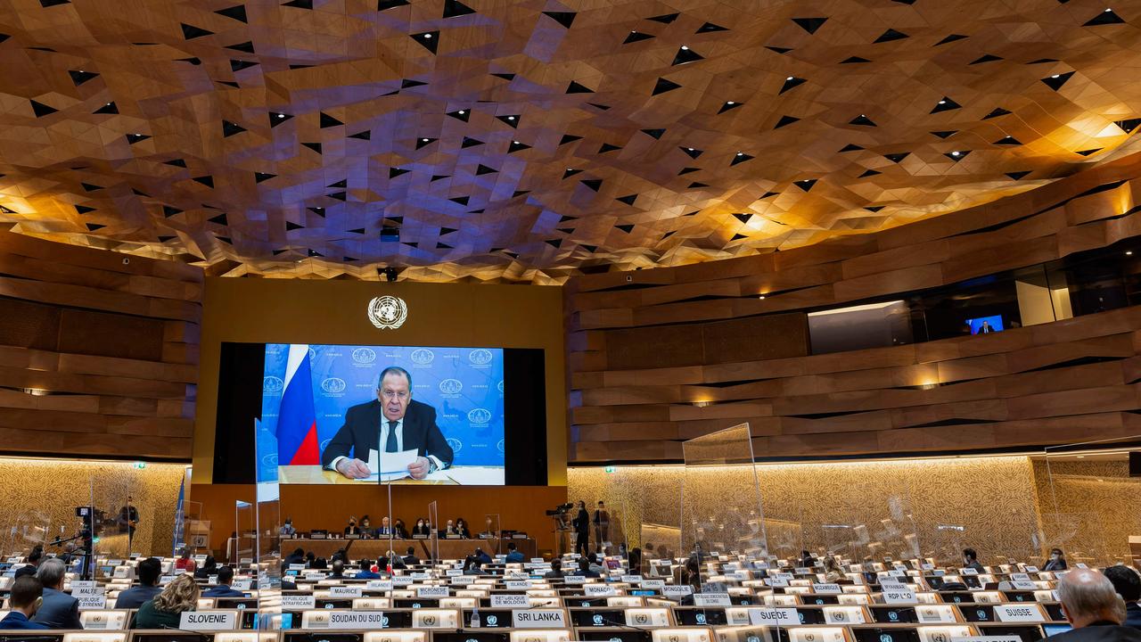 Russia's foreign minister Sergei Lavrov (on screen) addresses with a pre-recorded video afterUkraine's ambassador and diplomats staged a walkout. Picture: SALVATORE DI NOLFI / POOL / AFP