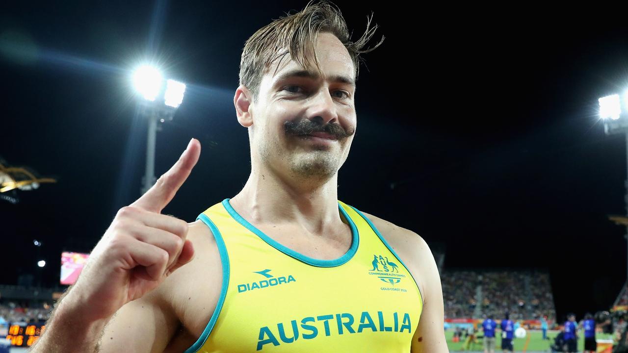 Evan O'Hanlon showcases his impressive moustache after winning  gold in the Men's T38 100m. Picture: Jason O'Brien/Getty Images