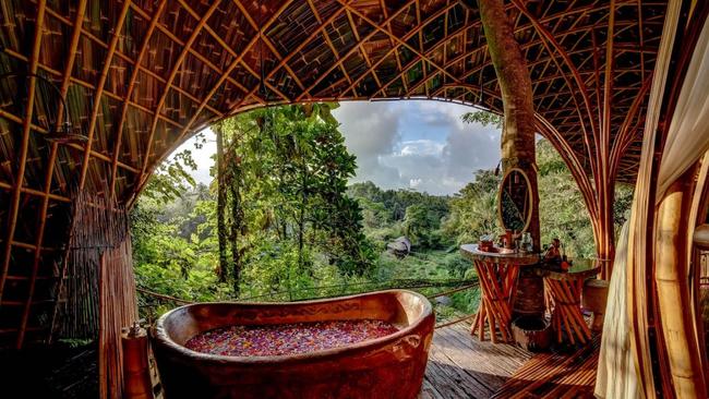 Best Bali resort for nature immersionIt’s hard to go past Bambu Indah for an all-in nature-based stay. The resort, in the lovely village of Sayan, has 17 unique wood and bamboo accommodation options dotted throughout a glorious three-hectare riverside property thick with jungle. It boasts three spring-fed swimming pools, a waterfall and an enchanting bamboo lift.Book here