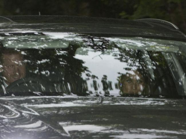 Prince Harry in an Audi drives his girlfriend, the American actor Meghan Markle, to the wedding reception of Pippa Middleton and her husband James Matthews. Picture: News Group Newspapers Ltd.