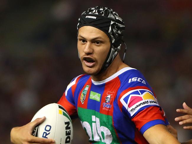 NEWCASTLE, AUSTRALIA - APRIL 07:  Kalyn Ponga of the Knights is tackled during the round five NRL match between the Newcastle Knights and the Brisbane Broncos at McDonald Jones Stadium on April 7, 2018 in Newcastle, Australia.  (Photo by Tony Feder/Getty Images)