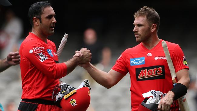 Aaron Finch and Afghanistan star Mohammad Nabi during the Big Bash . Picture: AAP Image/Hamish Blair