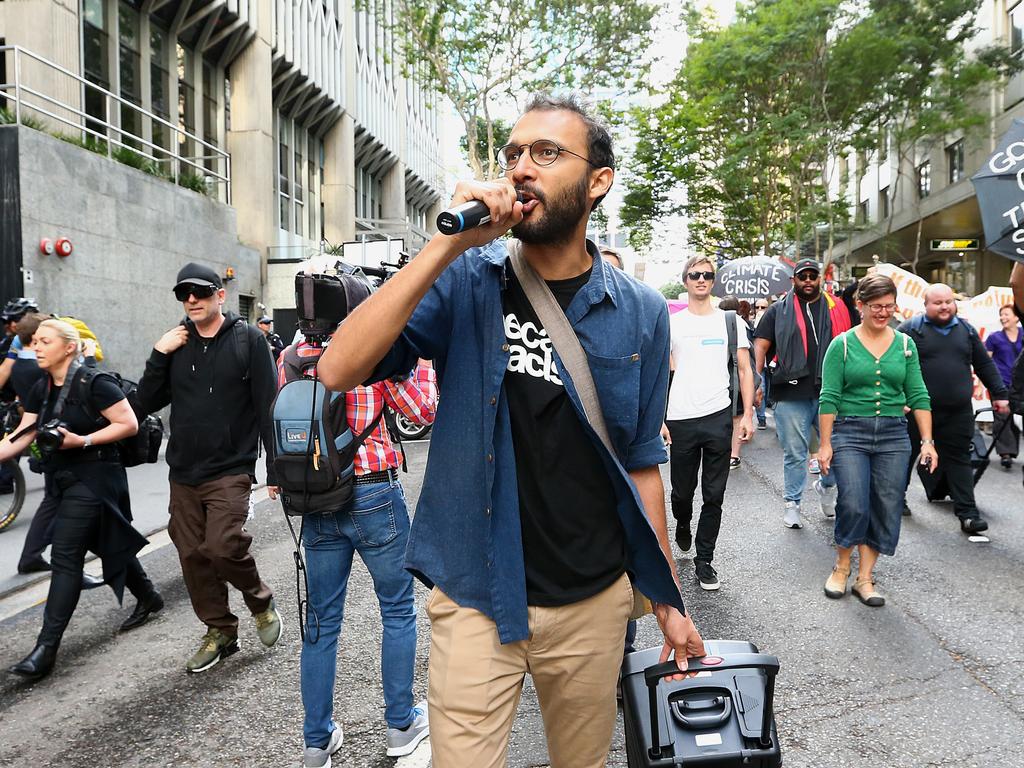 Former Greens councillor Jonathan Sri leads environmental protesters during morning protests in Brisbane in 2019. Picture: Jono Searle