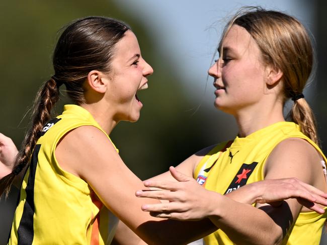 MELBOURNE, AUSTRALIA - MARCH 27: Emma Stark and Grace Whittaker of the Northern Territory celebrate a goal during the NAB League Girls Rd 10 match between the Murray Bushrangers and Northern Territory at Highgate Reserve on March 27, 2022 in Melbourne, Australia. (Photo by Morgan Hancock/AFL Photos/via Getty Images)