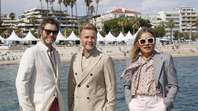 Take That’s Howard Donald, Gary Barlow and Mark Owen at Cannes.