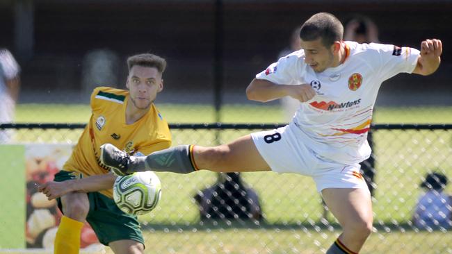 MetroStars’ Rocky Callisto and Cumberland’s Callum Elms battle for the ball. Picture: AAP Image/Dean Martin