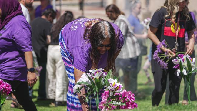 The 200-strong crowd outside Alice Springs Court House joined a Territory-wide day of action in Tuesday calling for domestic violence funding reform.