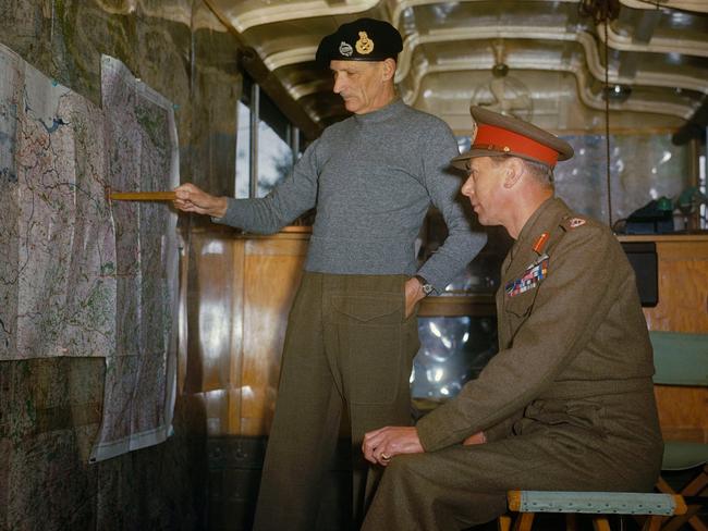 Second World War photos in colour — Field Marshal Sir Bernard Montgomery explains Allied strategy to King George VI in his command caravan in Holland, October 1944. Picture: Imperial War Museum